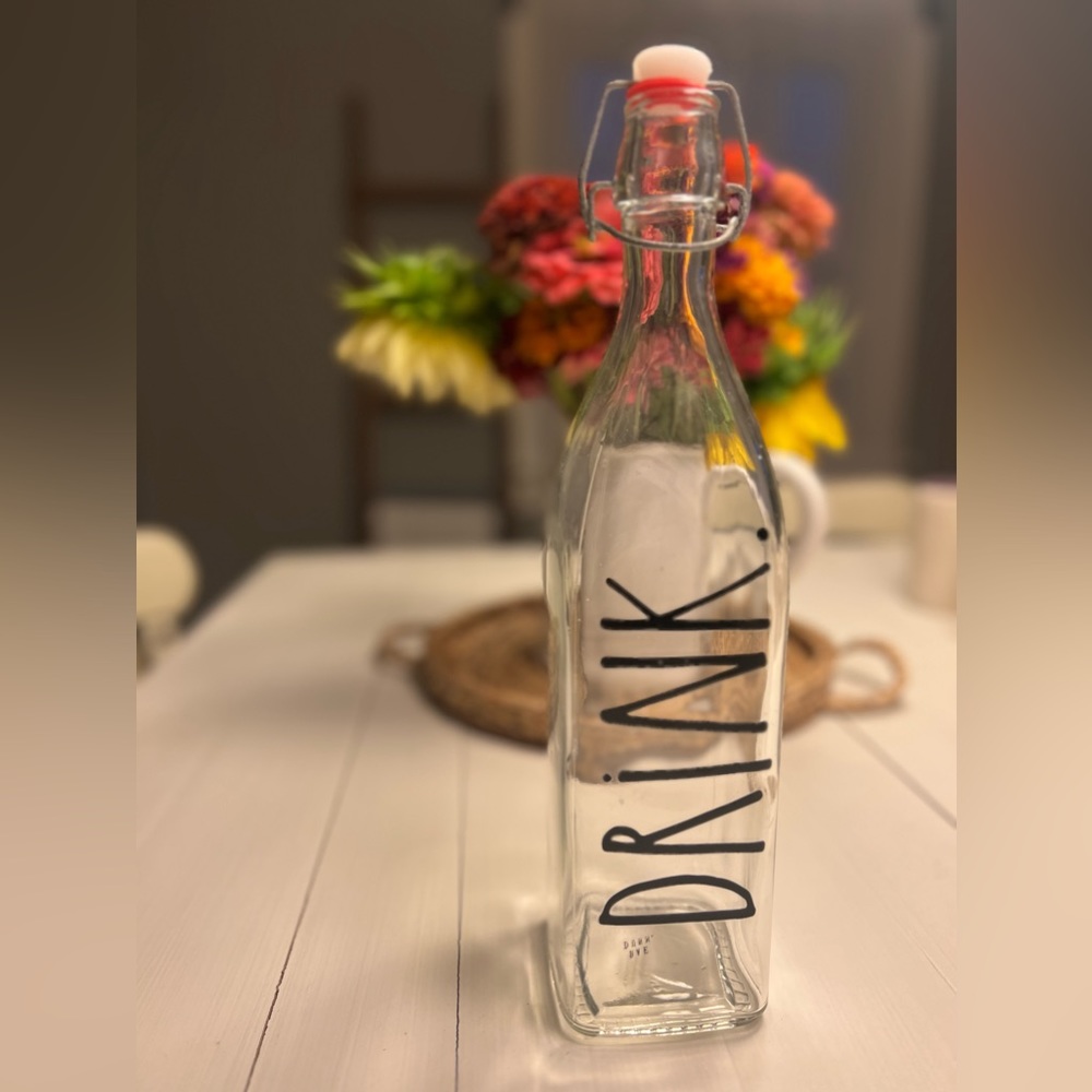 Rae Dunn DRINK bail & trigger glass bottle